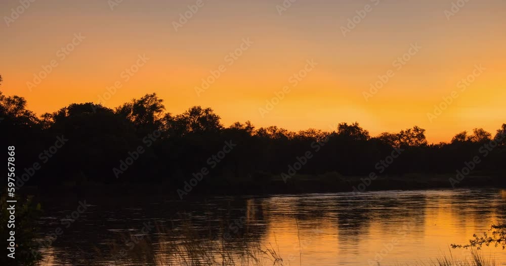 Sunrise timelapse looking over the Luangwa river in South Luangwa National park, Zambia Sunrise timelapse looking over the Luangwa river in South Luangwa National park, Zambia