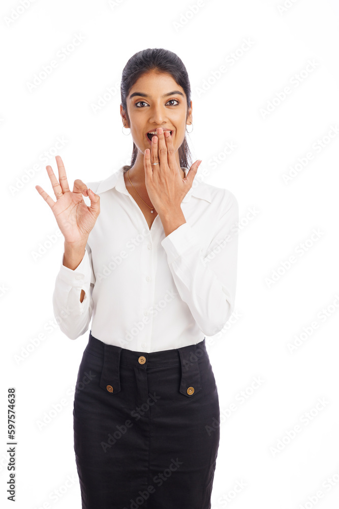 Cheerful young business woman showing ok hand sign isolated on white. Cheerful young business woman showing ok hand sign isolated on white.