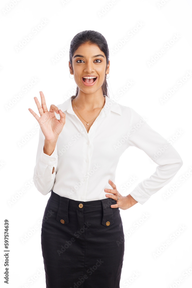 Cheerful young business woman showing ok hand sign isolated on white. Cheerful young business woman showing ok hand sign isolated on white.