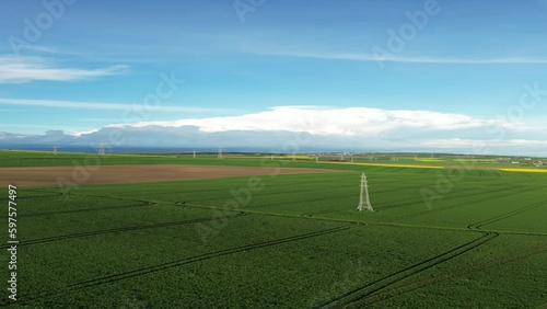 Aerial View of Agriculture Fields with Cloudy Sky
