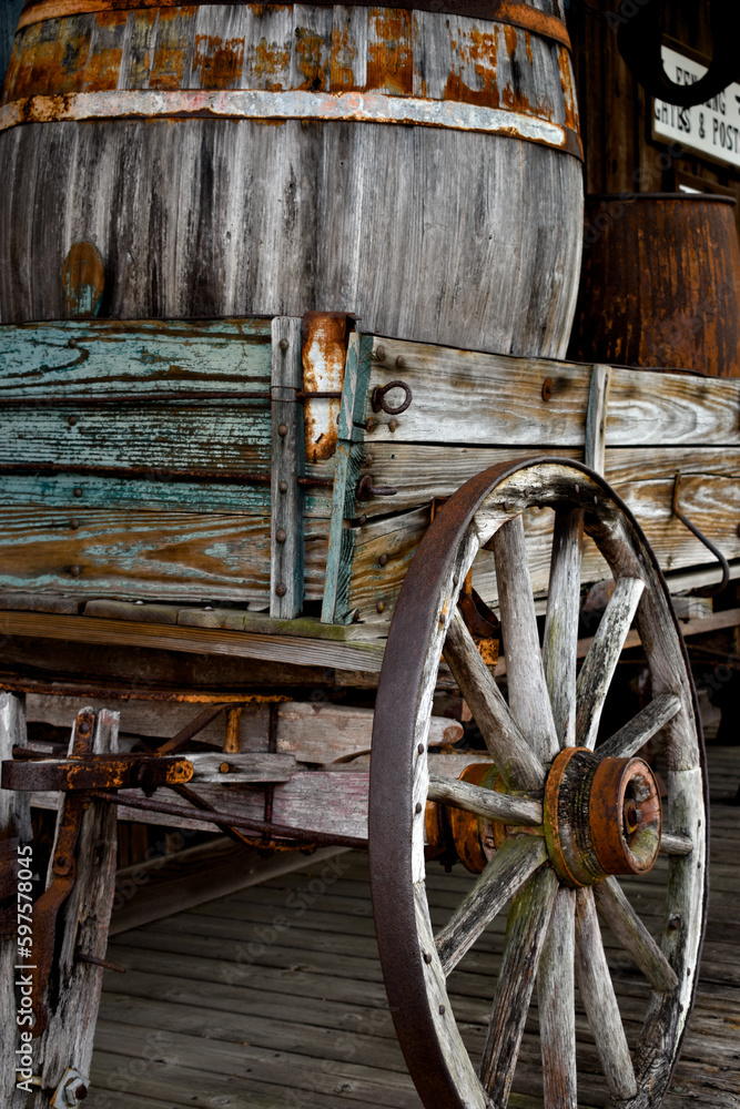 Old vintage wood hitch wagon and wood barrels