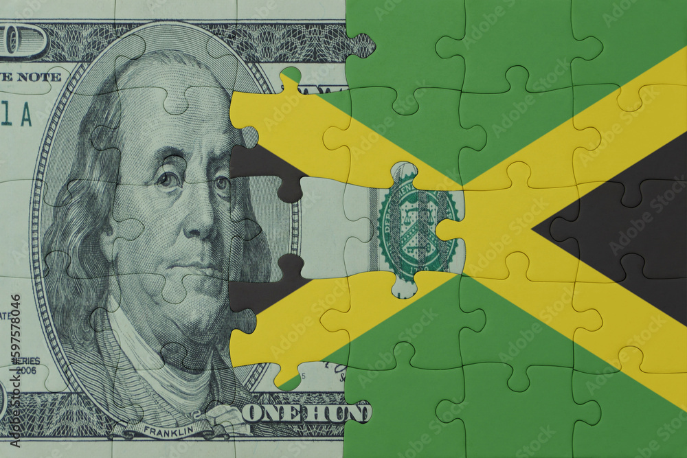 puzzle with the national flag of jamaica and dollar money banknote. macro.concept.