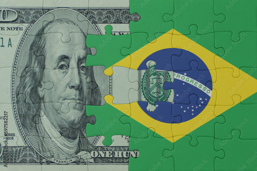 puzzle with the national flag of brazil and dollar money banknote. macro.concept.