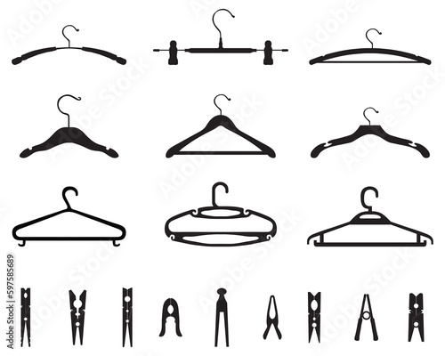 Set of different hangers and clothespins on a white background