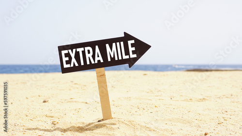 Go the extra mile is shown using the text on the road sign photo