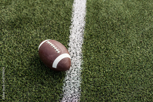 American football rugby ball on the court.