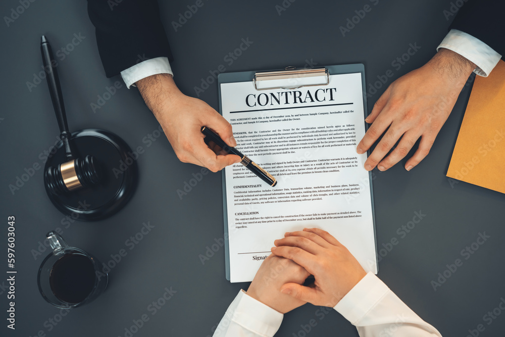 Top view lawyer colleagues or legal team working or drafting legal document at law firm office ...