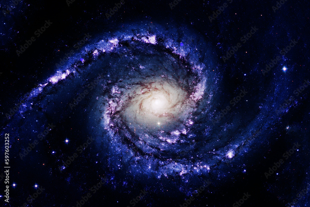 A beautiful purple galaxy in dark space. Elements of this image furnished NASA.
