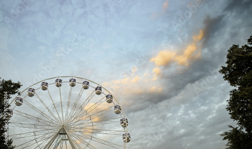 ferries wheel and sunset sky