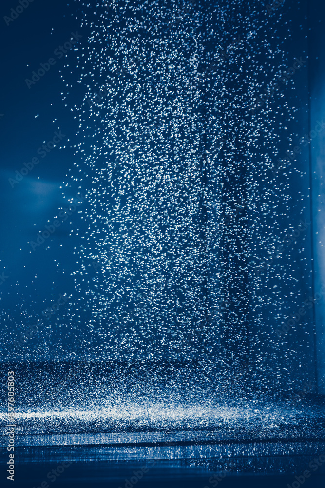 drops of water fall from the shower in the bathroom - obrazy, fototapety, plakaty 