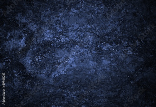 Background of black dark black grunge textured concrete stone wall with the effect of light © fatima