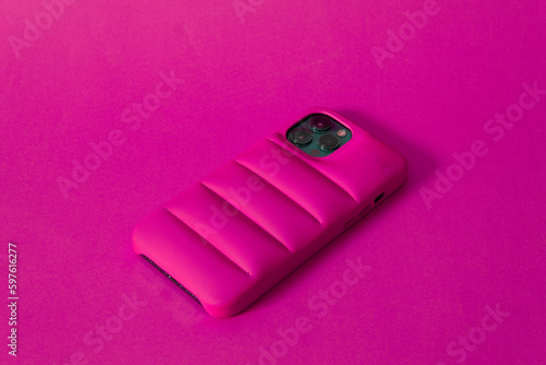 Pink puffer case on pink background. 
Iphone case. 