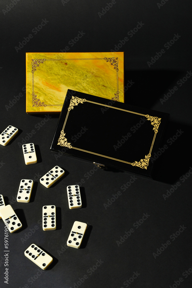 Dominoes on black background. Dominoes on black background.