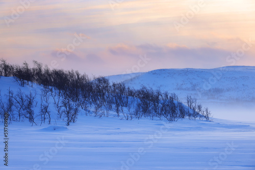 Sunset winter landscape in Lapland, Enontekio, Finland, Europe 