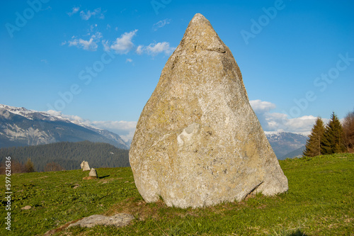 Large Standing Stone in Line with smaller Megaliths in Parc la Mutta, Falera, Switzerland photo