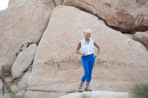 Senior Woman in the desert expressing wellness and heath.  © Elena Ray