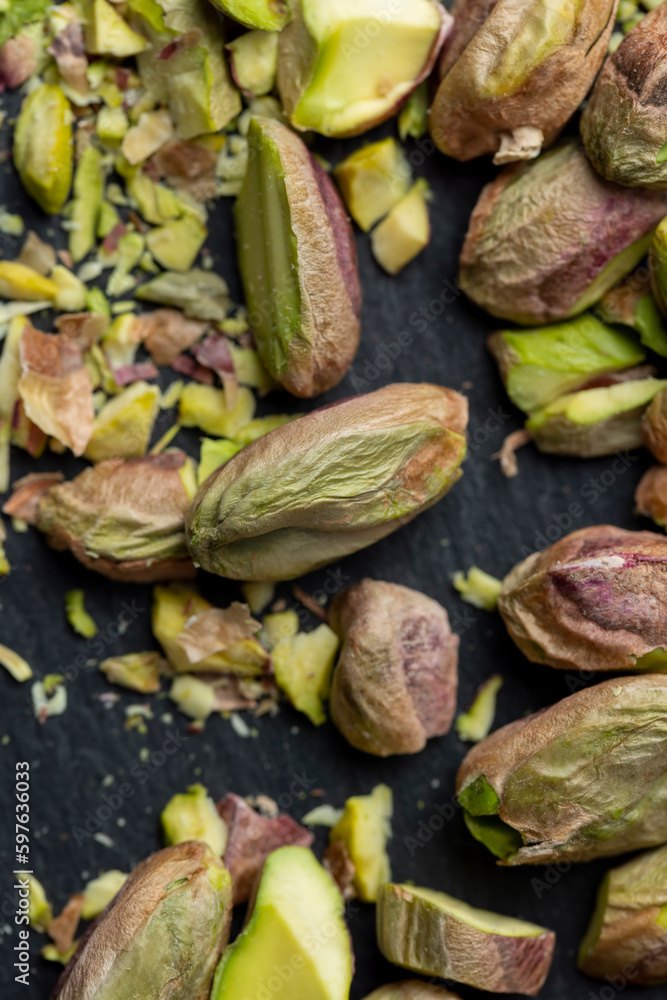 Crispy delicious pistachios with salt on the table Crispy delicious pistachios with salt on the table