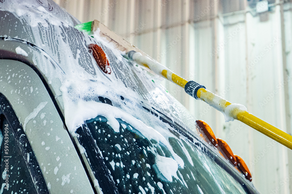 A bustling truck maintenance shop, providing comprehensive truck wash services and expert repair solutions for both trucks and trailers.