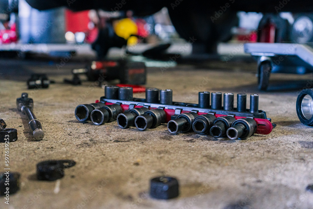 A bustling truck maintenance shop, providing comprehensive truck wash services and expert repair solutions for both trucks and trailers.
