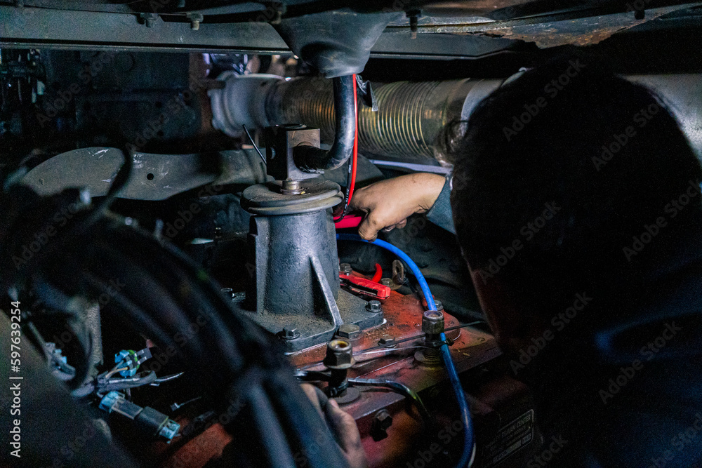 A bustling truck maintenance shop, providing comprehensive truck wash services and expert repair solutions for both trucks and trailers.
