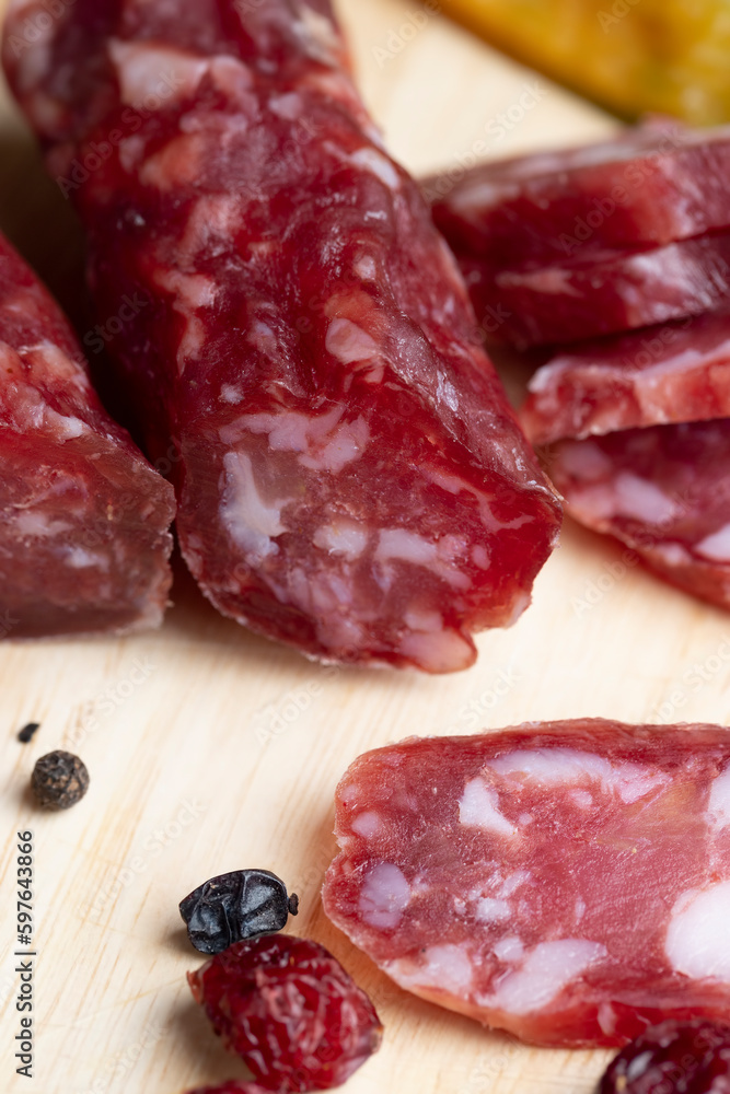 sliced sausage from pieces of meat with bacon sliced sausage from pieces of meat with bacon