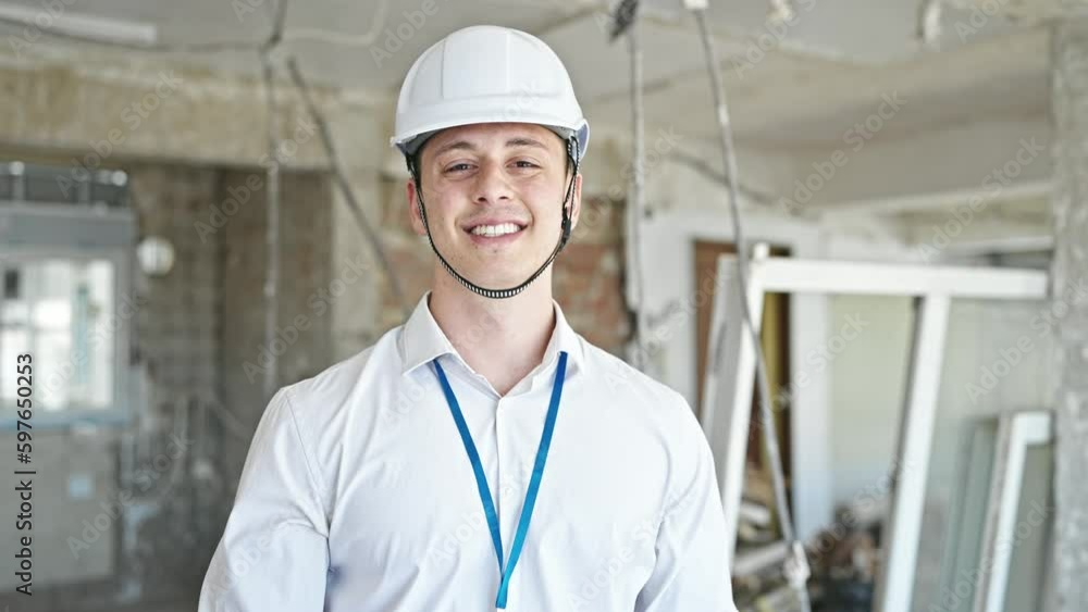 Young hispanic man architect smiling confident taking out glasses at construction site Young hispanic man architect smiling confident taking out glasses at construction site