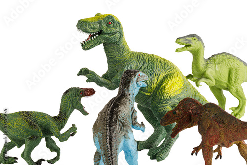 Group of smaller toy Tyrannosaurus Rex dinosaurs attacking  adult Tyrannosaurus