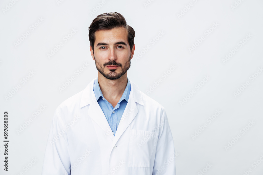 Man doctor in white coat looking into camera on white isolated background, copy space, space for text, health Man doctor in white coat looking into camera on white isolated background, copy space, space for text, health
