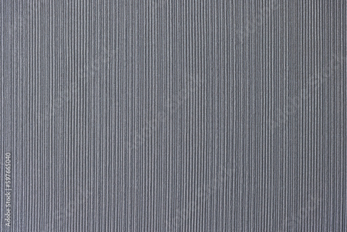 Grey fabric with thin white stripes for sale in atelier