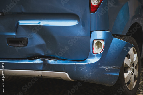 Φωτογραφία A car with a dented bumper has been damaged in road accident