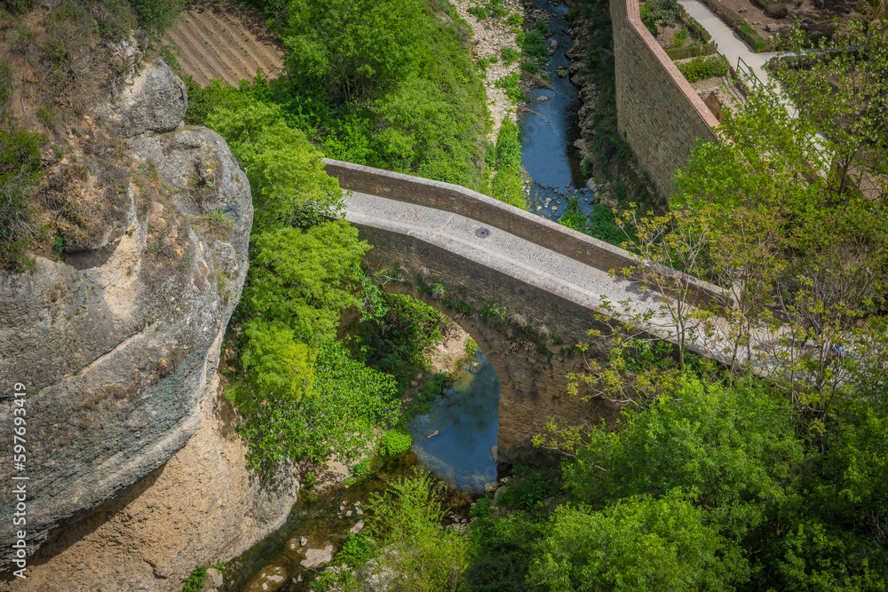 View on Puente de las Curtidurias in Ronda, a historical city in Andalusia View on Puente de las Curtidurias in Ronda, a historical city in Andalusia