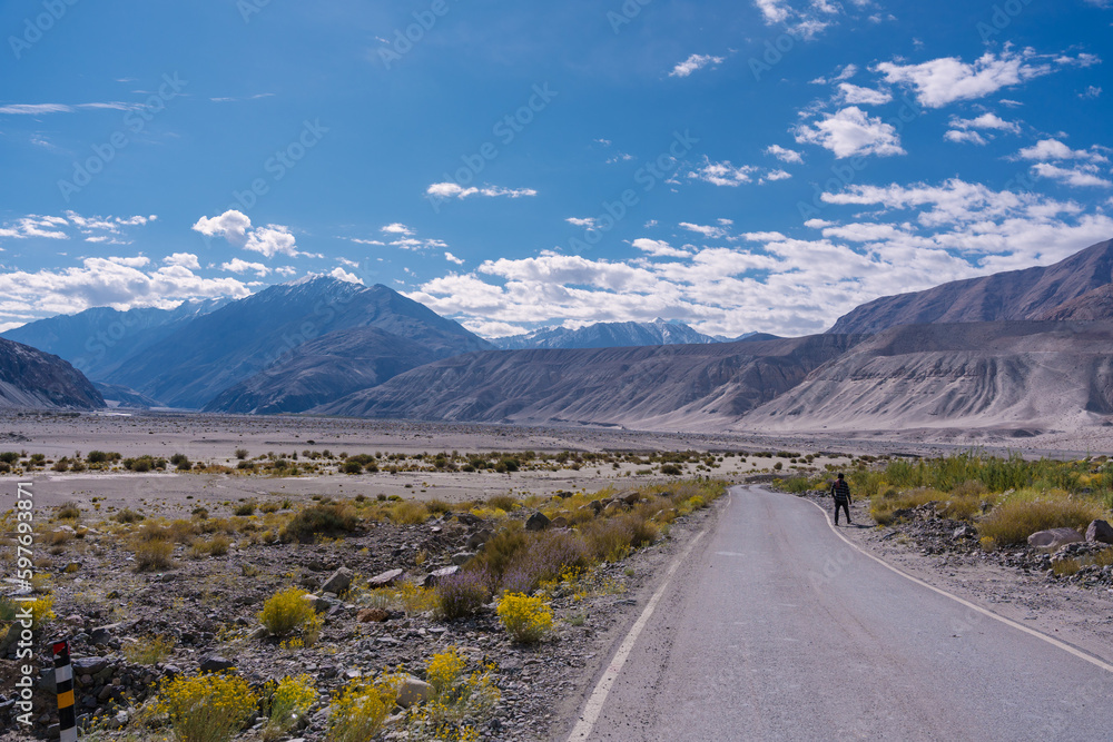 beautiful scenery road to Pangong lake with mountain and blue sky at Ladakh, India