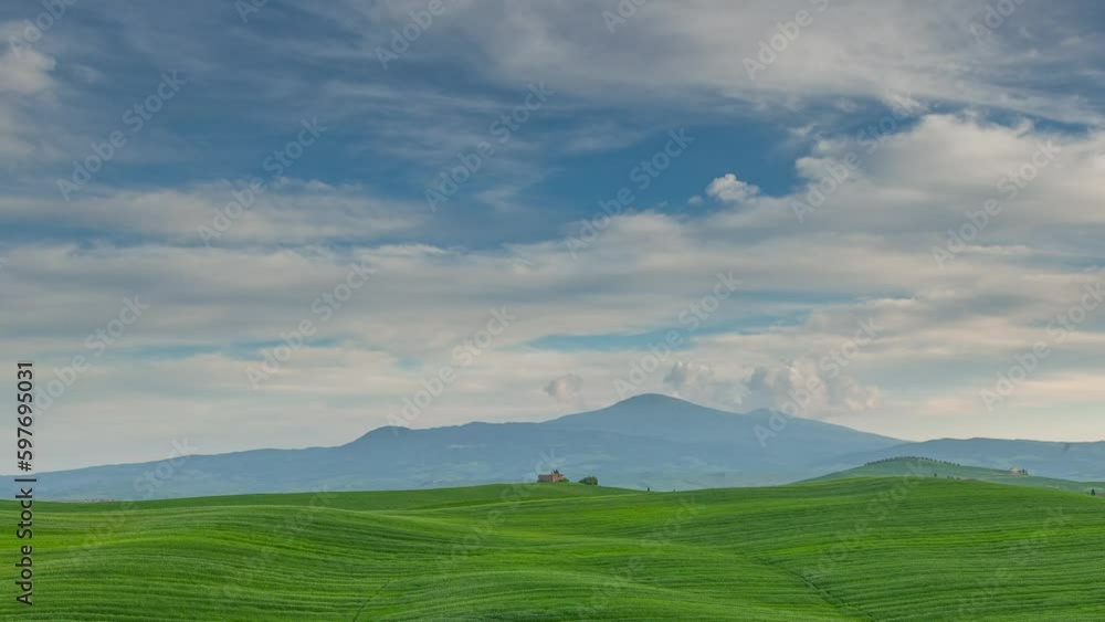 Landscape in Tuscany with green fields and hills, time-lapse 4k video Landscape in Tuscany with green fields and hills, time-lapse 4k video