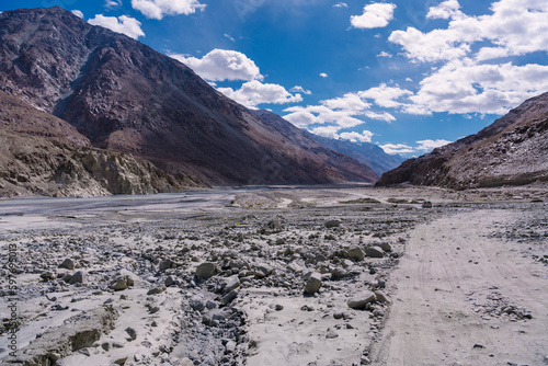 road with two sides are high mountains, and blue sky. Beautiful scenery on the way to pangong lake, Leh, Ladakh, Jammu and Kashmir, India