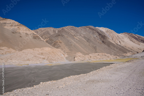 beautiful scenery, the river flows between the foothills of the mountains in the valley at ladakh, India