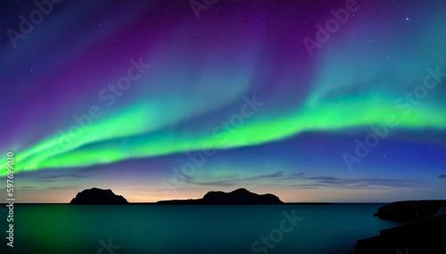 Night sky with aurora borealis over sea and silhouette of hills on horizon © Jaroslav Machacek