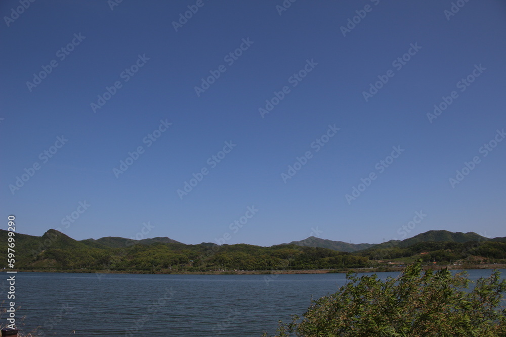 Clear blue sky and the lake with mountain