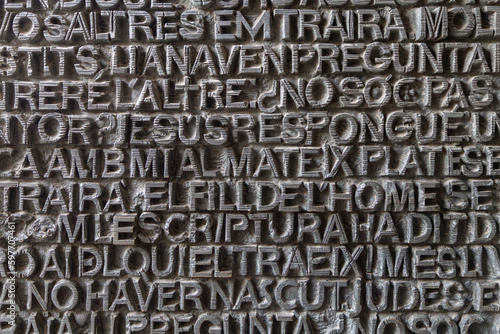 metallic ancient latin letters background texture (illegible inscriptions)