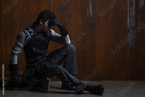 Photos A young man in a Victorian-style suit, a retro character