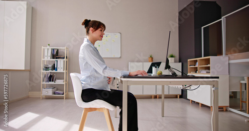 Pregnant Woman In Office. Businesswoman Executive Sitting © Andrey Popov