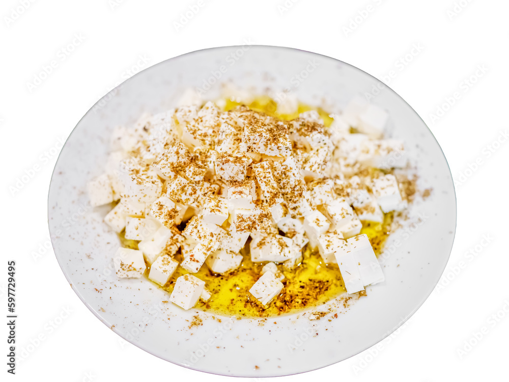 Fresh feta cheese full of olive oil and oregano white isolated Fresh feta cheese full of olive oil and oregano white isolated