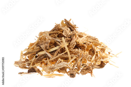 Pile of dried angelica root (Angelica archangelica), isolated on white background photo