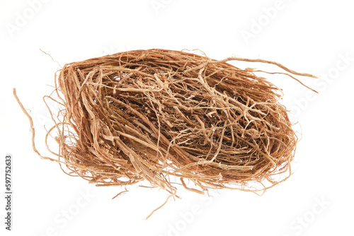 Pile of dried vetiver root (Vetiveria zizanioides), isolated on white background