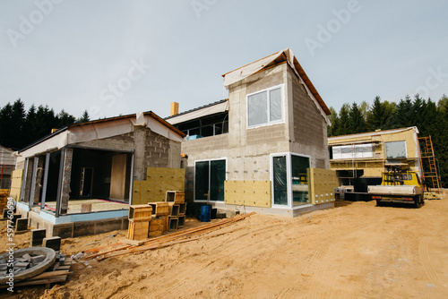 construction of private modern cottages. on the walls of the house is applied with insulation