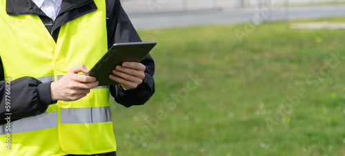 Engineer with digital tablet computer