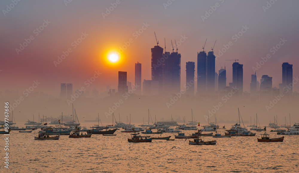 Air pollution concept - Modern highrise rich buildings and poor slums at sunset - Mumbai, india 