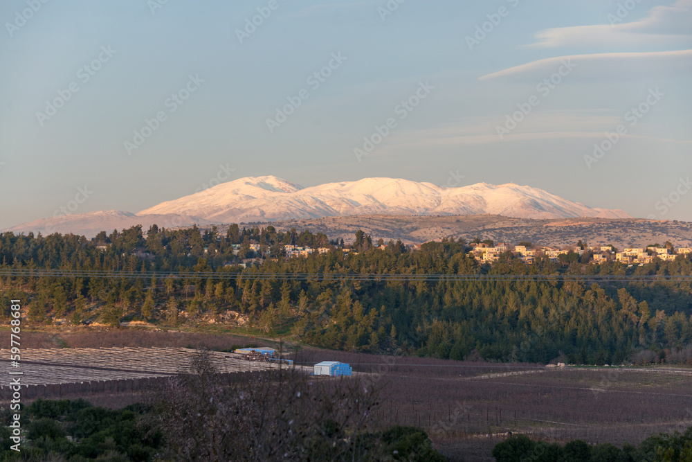 The snowy peak of Mount Hermon. A look from Galilee mountains
