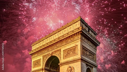 Celebratory fireworks over the Arc de Triomphe ( 4K, time lapse), Paris, France. The walls of the arch are engraved with the names of 128 battles and names of 660 French military leaders (in French)  photo