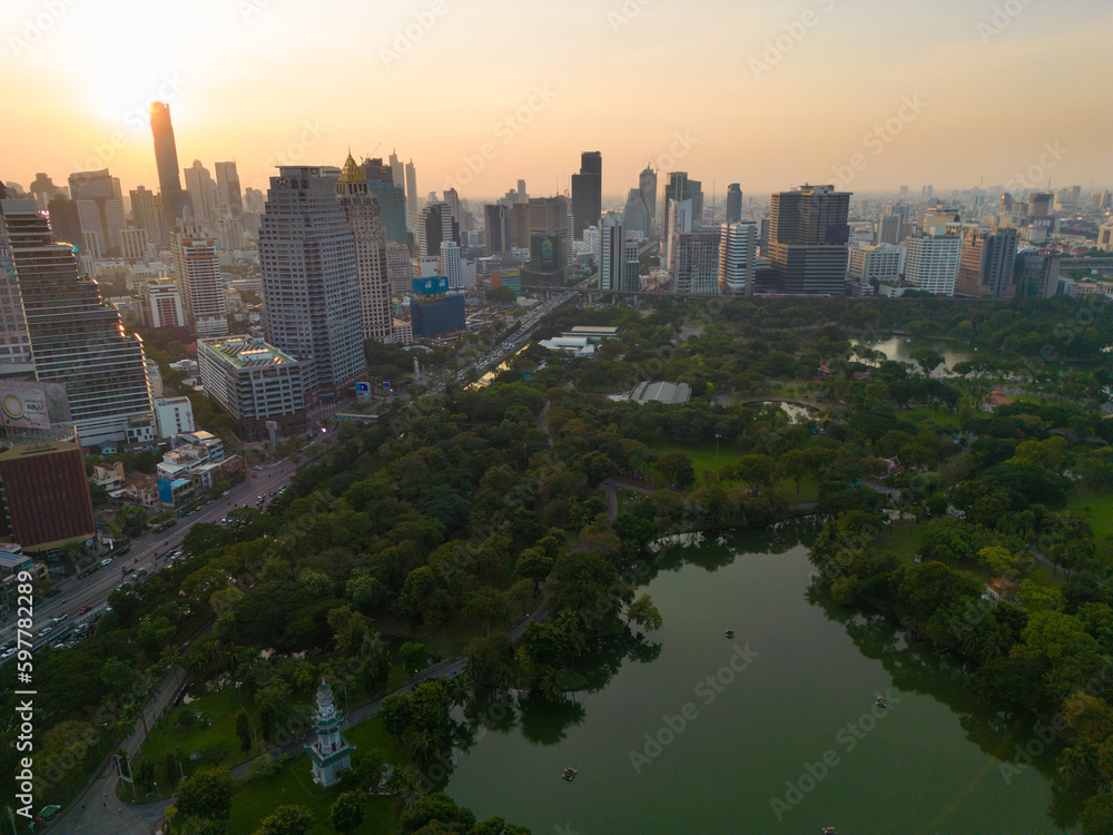 Lumpini park with office building in Bangkok city central of Thailand