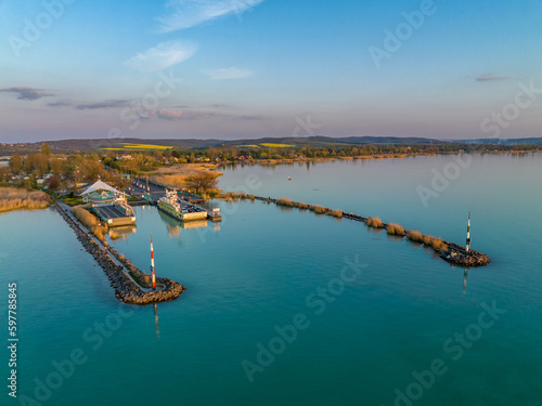 Hungary - Ferry between Szántód and Tihany on Lake Balaton at sunset time from drone view